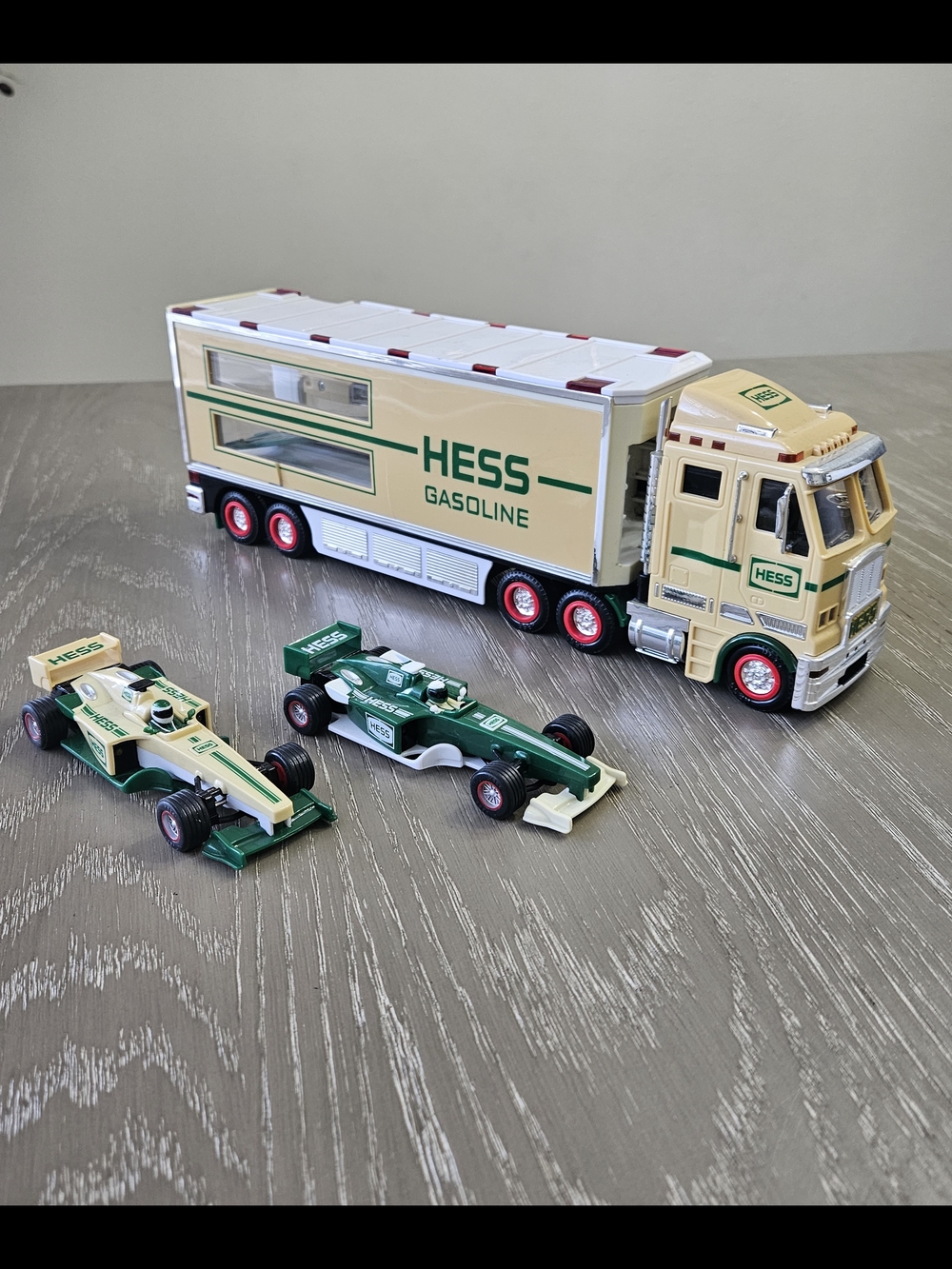 HESS 2003 TOY TRUCK AND 2 RACECARS BROKEN TRAILER